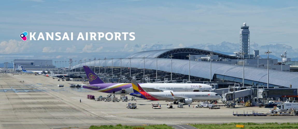 Kansai International Airport terminal with airplanes, well-suited for airport transfer needs.