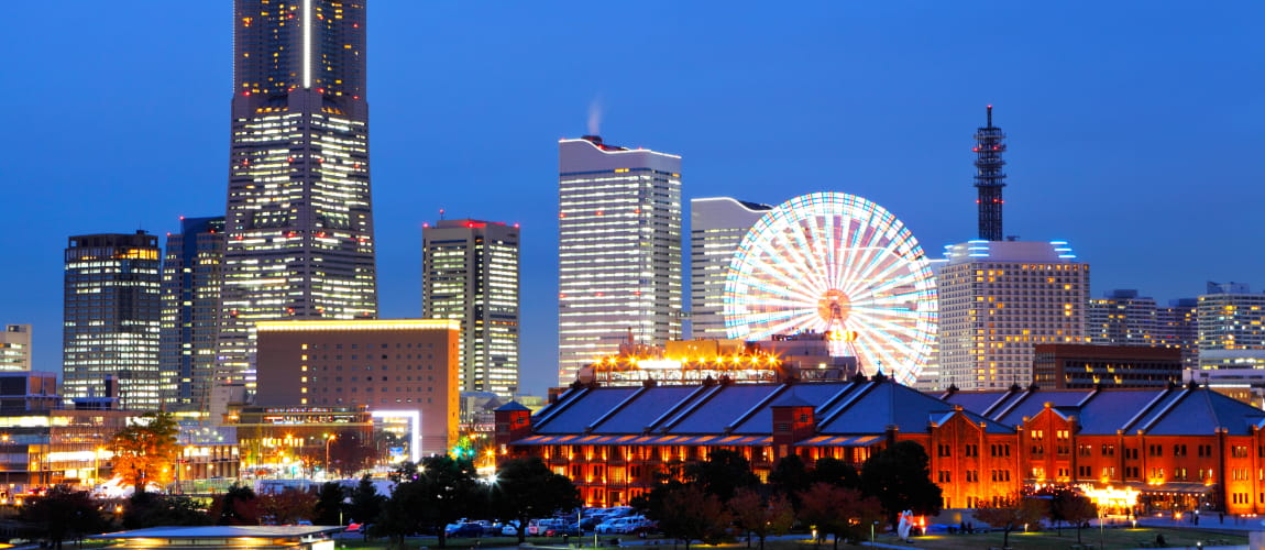 Yokohama night cityscape with landmarks, fitting for luxury travel and concierge services.